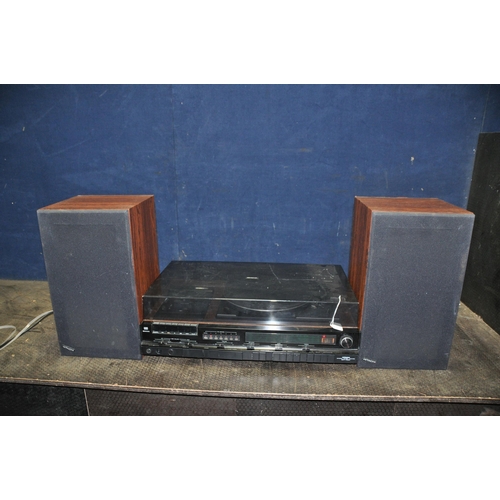 1065 - A MID CENTURY HITACHI SDT-7680 MUSIC CENTRE with rosewood effect vinyl covering, smoked Plexi glass ... 