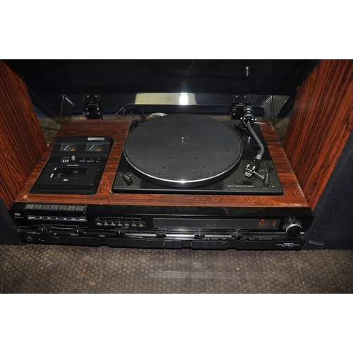 1065 - A MID CENTURY HITACHI SDT-7680 MUSIC CENTRE with rosewood effect vinyl covering, smoked Plexi glass ... 