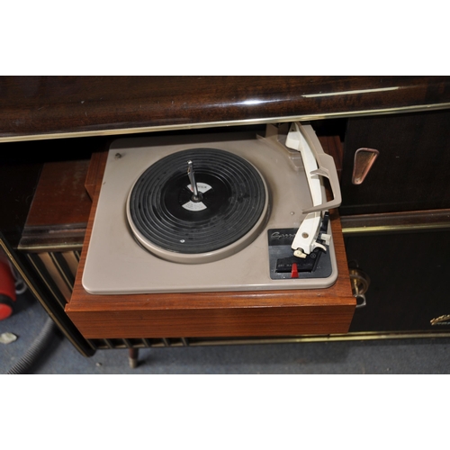 1067 - A 1940s BLAUPUNKT KANSAS DE LUXE RADIO GRAM with polished walnut veneer cabinet, a Garrard turntable... 