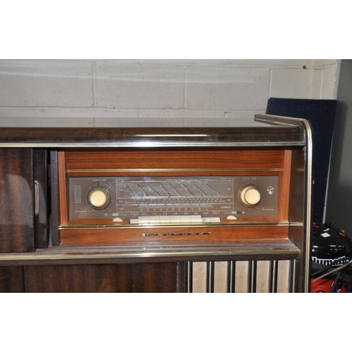 1067 - A 1940s BLAUPUNKT KANSAS DE LUXE RADIO GRAM with polished walnut veneer cabinet, a Garrard turntable... 