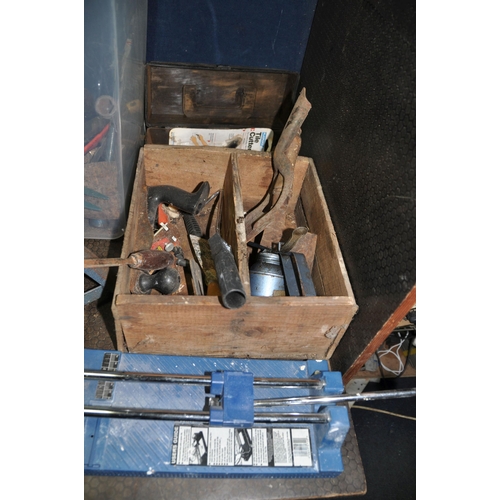 1069 - THREE TRAYS CONTAINING TOOLS including an untested Wickes tile cutter, three axle stands, a Record N... 