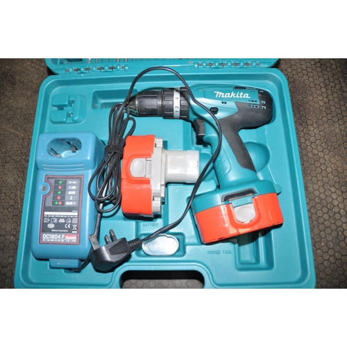 1076 - A MAKITA 8391D 18V DRILL IN CASE with two batteries, charger and drills and driver bits (Condition R... 