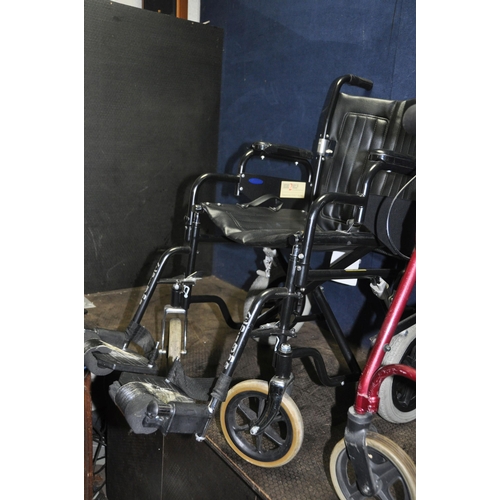 A WHEELTECH ENIGMA WHEELCHAIR with two footrests and a Z-Tec Travelator ...