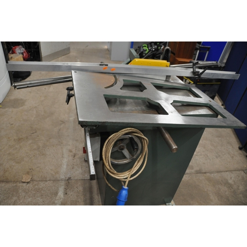 1097 - AN INDUSTRIAL TABLE SAW WITH 12in BLADE bed width 77cm depth 71cm height 91cm, with articulated arm,... 