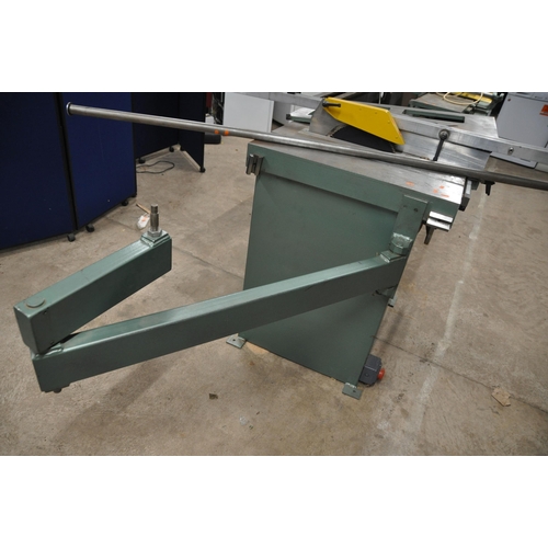 1097 - AN INDUSTRIAL TABLE SAW WITH 12in BLADE bed width 77cm depth 71cm height 91cm, with articulated arm,... 