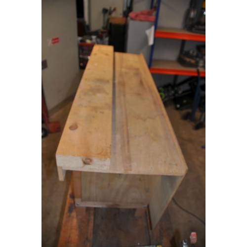 1101 - A PINE WORKBENCH WITH PLYWOOD TOP AND PANELS width 168cm depth 54cm height 85cm