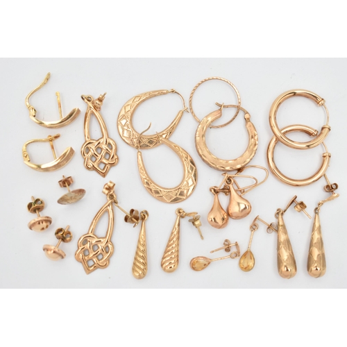 23 - A SELECTION OF YELLOW METAL EARRINGS, to include one pair of earrings with star accent detail, stamp... 