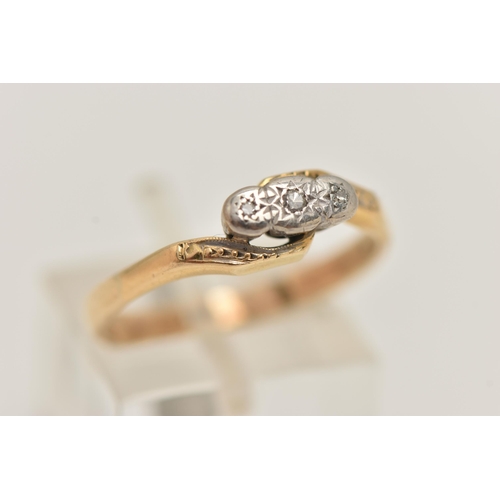 25 - A YELLOW METAL DIAMOND RING, three single cut diamonds, illusion set in a white metal mount, cross o... 