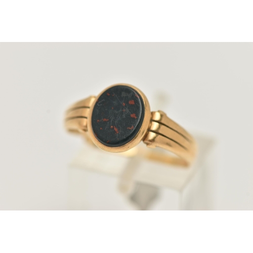 28 - AN 18CT GOLD BLOODSTONE SIGNET RING, designed as a polished oval bloodstone inlay, collet set to the... 