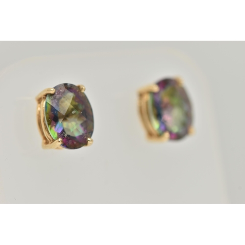 38 - A PAIR OF MYSTIC TOPAZ STUD EARRINGS, each designed as an oval mystic topaz in a four claw setting, ... 