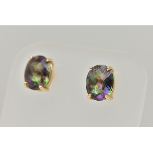 38 - A PAIR OF MYSTIC TOPAZ STUD EARRINGS, each designed as an oval mystic topaz in a four claw setting, ... 