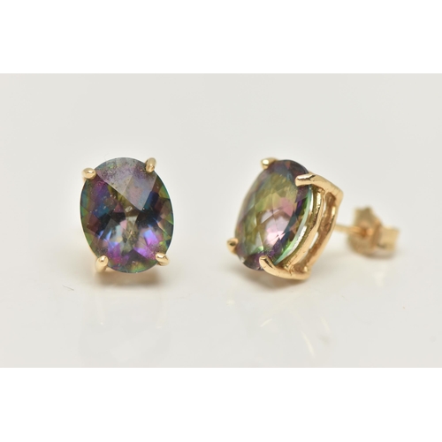 38 - A PAIR OF MYSTIC TOPAZ STUD EARRINGS, each designed as an oval mystic topaz in a four claw setting, ... 