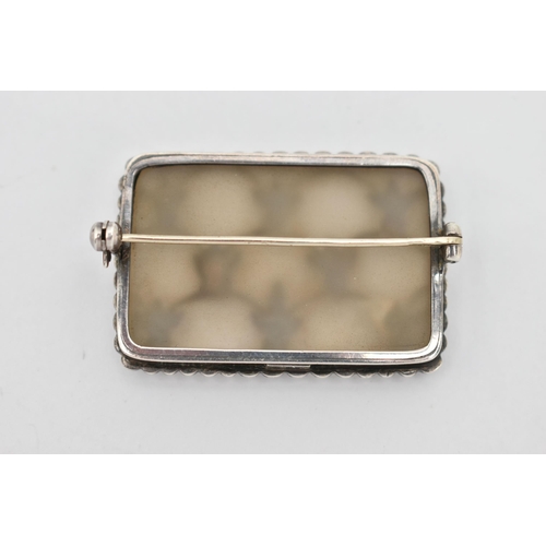 43 - A WHITE METAL 'THEODORE FAHRNER' GEM SET BROOCH, of a rectangular form, set with colourless quartz i... 