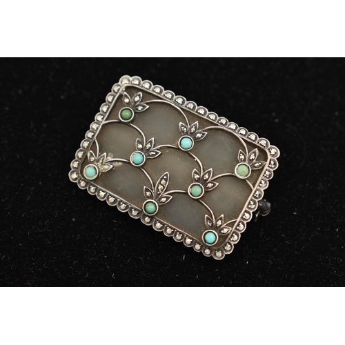 43 - A WHITE METAL 'THEODORE FAHRNER' GEM SET BROOCH, of a rectangular form, set with colourless quartz i... 