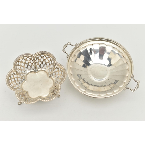 75 - TWO SILVER BONBON DISHES, the first a scalloped form dish with pierced detail, raised on three feet,... 