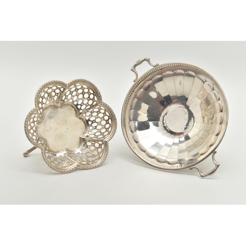 75 - TWO SILVER BONBON DISHES, the first a scalloped form dish with pierced detail, raised on three feet,... 