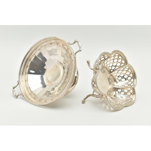 75 - TWO SILVER BONBON DISHES, the first a scalloped form dish with pierced detail, raised on three feet,... 