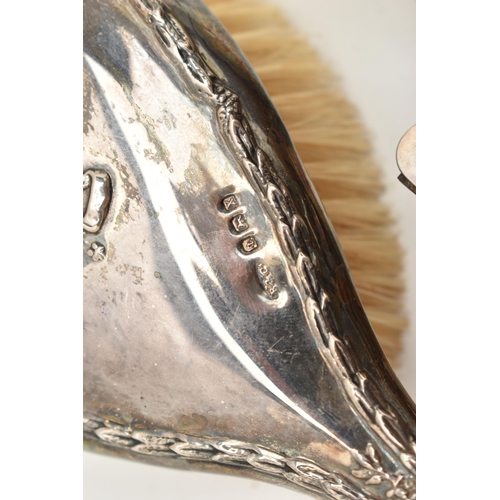 78 - THREE ITEMS OF SILVERWARE, to include a 1920's silver mounted hairbrush, hallmark for Birmingham 192... 