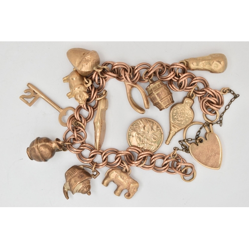 8 - A 9CT GOLD CHARM BRACELET, double curb link bracelet, some links stamped 9.375, fitted with a heart ... 