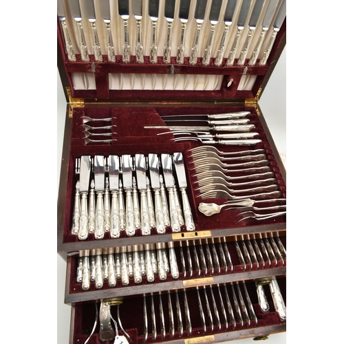 112 - A LARGE CANTEEN OF SILVER CUTLERY, a mahogany canteen with hinged lid and two drawers, encasing an a... 