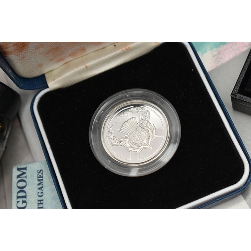 114 - A STRONG BOX CONTAINING MIXED COINAGE, to include a Royal Mint Jamaica boxed $25 Dollar Silver Proof... 