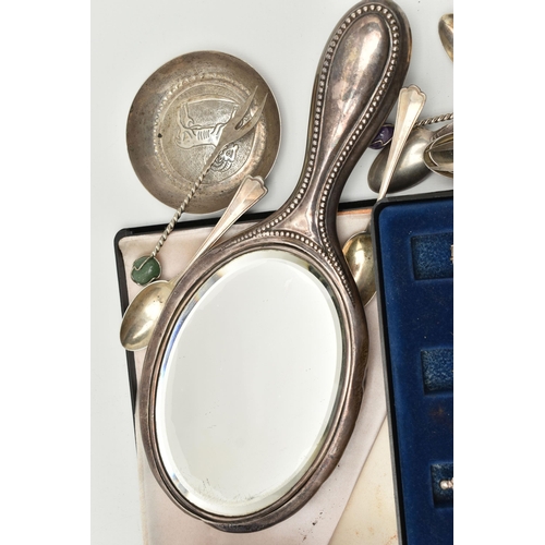 86 - AN ASSORTMENT OF SILVER OF WHITE METAL ITEMS, a silver handheld mirror with monogram engraving, hall... 