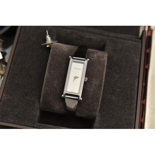 87 - A LADIES BOXED 'GUCCI' WRISTWATCH AND OTHER ITEMS, quartz movement, rectangular silver dial signed '... 