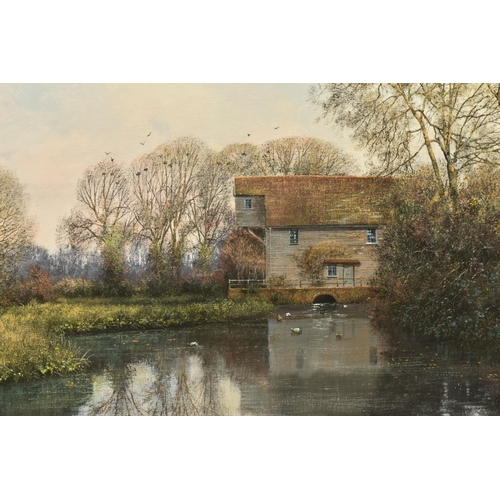 310 - CLIVE MADGWICK ( 1934-2005) A RIVER LANDSCAPE WITH WATERMILL, an autumn scene with ducks on the wate... 