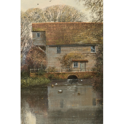 310 - CLIVE MADGWICK ( 1934-2005) A RIVER LANDSCAPE WITH WATERMILL, an autumn scene with ducks on the wate... 