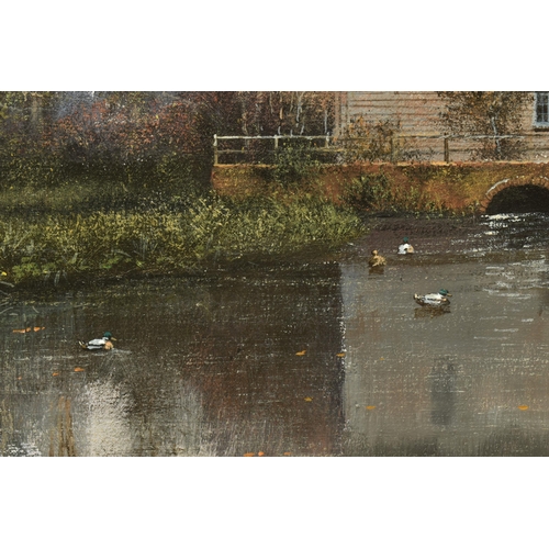 310 - CLIVE MADGWICK ( 1934-2005) A RIVER LANDSCAPE WITH WATERMILL, an autumn scene with ducks on the wate... 