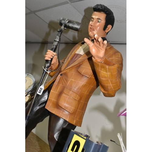 335 - A LARGE COMPOSITE FLOOR STANDING FIGURE OF AN ELVIS STYLE FIGURE, A.L.D designed by Jacobs, height 8... 