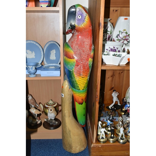 356 - A LARGE FLOOR PAINTED CARVED WOOD PARROT, floor standing, height 100cm and two carved wood walking s... 