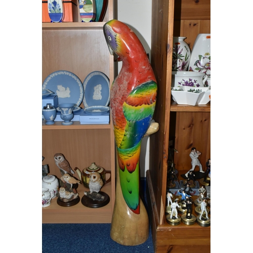 356 - A LARGE FLOOR PAINTED CARVED WOOD PARROT, floor standing, height 100cm and two carved wood walking s... 