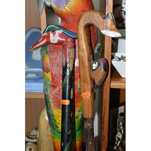 356 - A LARGE FLOOR PAINTED CARVED WOOD PARROT, floor standing, height 100cm and two carved wood walking s... 