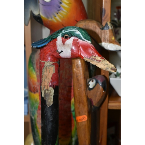 356 - A LARGE FLOOR PAINTED CARVED WOOD PARROT, floor standing, height 100cm and two carved wood walking s... 