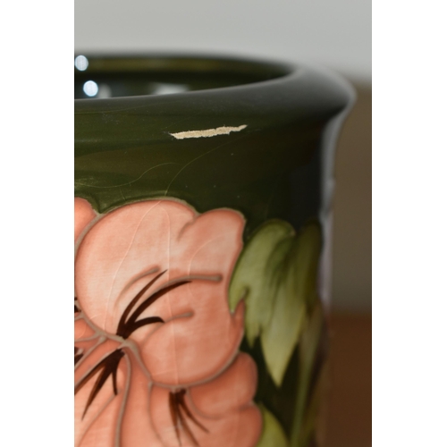 361 - A MOORCROFT POTTERY PLANTER, in the Coral Hibiscus pattern on a green ground, height 12.5cm x intern... 