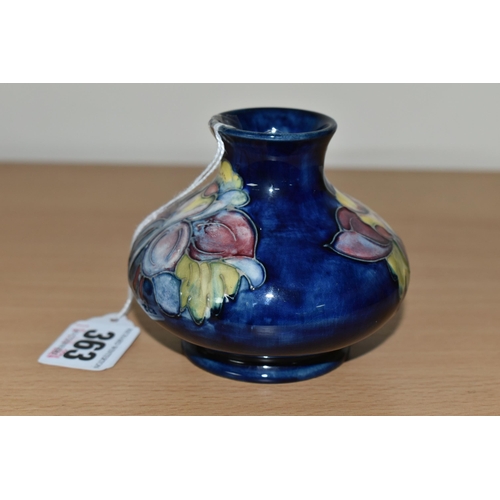 363 - A MOORCROFT POTTERY 'COLUMBINE' PATTERN VASE, of squat form, tube lined with yellow, pink and purple... 