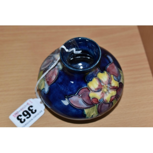 363 - A MOORCROFT POTTERY 'COLUMBINE' PATTERN VASE, of squat form, tube lined with yellow, pink and purple... 