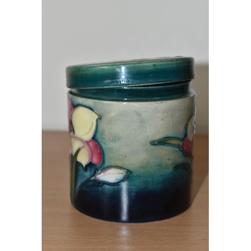 367 - A MOORCROFT POTTERY 'FREESIA' PATTERN COVERED JAR, of cylindrical form, tube lined with pale yellow ... 