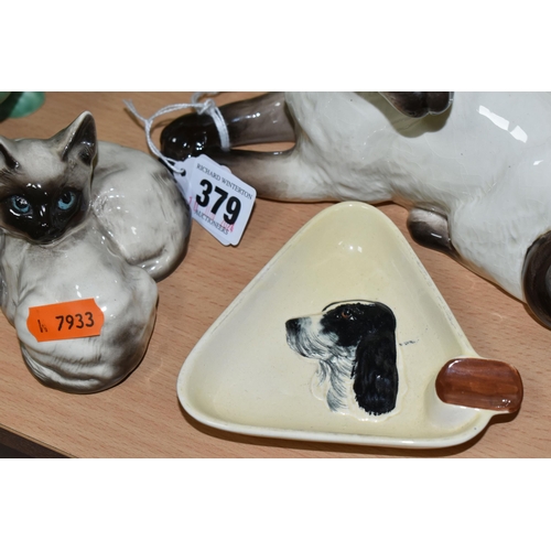 379 - A GROUP OF ANIMAL THEMED CERAMICS, comprising a Beswick lying down Siamese cat no 1558, Beswick Siam... 