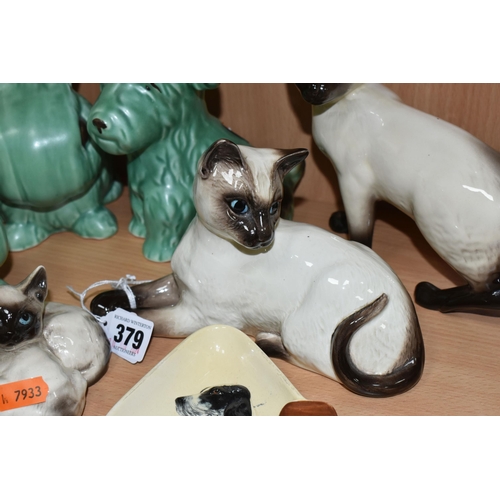 379 - A GROUP OF ANIMAL THEMED CERAMICS, comprising a Beswick lying down Siamese cat no 1558, Beswick Siam... 