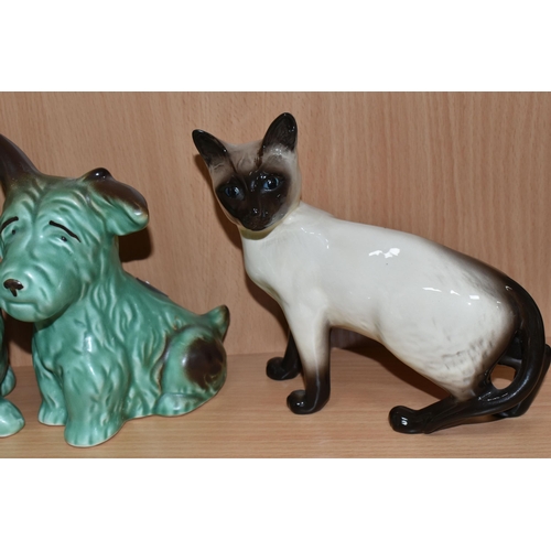 379 - A GROUP OF ANIMAL THEMED CERAMICS, comprising a Beswick lying down Siamese cat no 1558, Beswick Siam... 