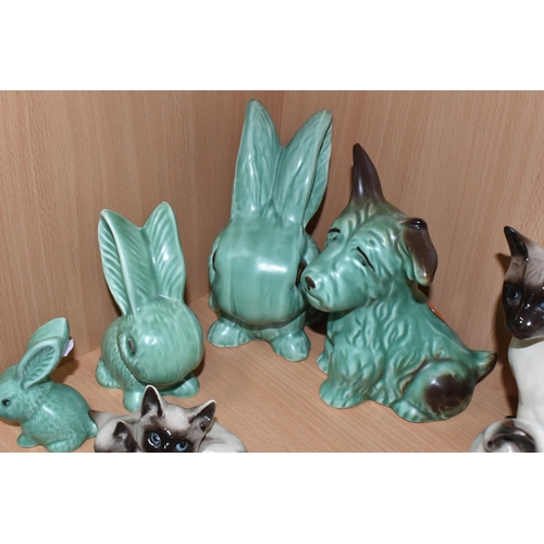 379 - A GROUP OF ANIMAL THEMED CERAMICS, comprising a Beswick lying down Siamese cat no 1558, Beswick Siam... 