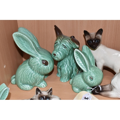 379 - A GROUP OF ANIMAL THEMED CERAMICS, comprising a Beswick lying down Siamese cat no 1558, Beswick Siam... 