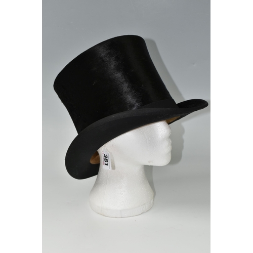 381 - A TOP HAT, by Cater and Sons of 88, St James Street, London SW, internal measurements 19.5cm x 16cm,... 