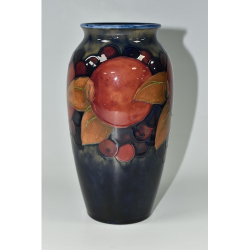 391 - A MOORCROFT POTTERY 'POMEGRANATE' PATTERN VASE, of ovoid form, tube lined with pomegranates, berries... 