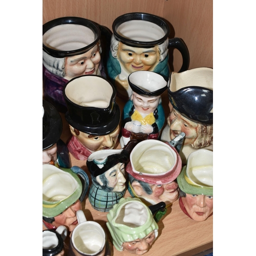 399 - A GROUP OF CHARACTER JUGS, SAILOR DOLLS AND ANIMAL FIGURES, to include two Nora Wellings style souve... 