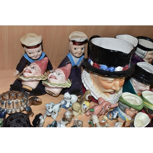 399 - A GROUP OF CHARACTER JUGS, SAILOR DOLLS AND ANIMAL FIGURES, to include two Nora Wellings style souve... 