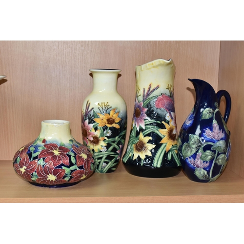 405 - FOUR PIECES OF OLD TUPTON WARE, comprising a jug and a vase in Summer Bouquet pattern, a squat vase ... 