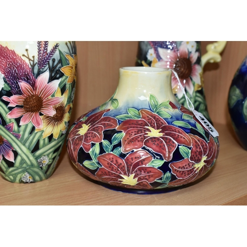 405 - FOUR PIECES OF OLD TUPTON WARE, comprising a jug and a vase in Summer Bouquet pattern, a squat vase ... 